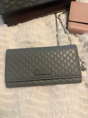 Gucci Gray GG Embossed Leather Wallet